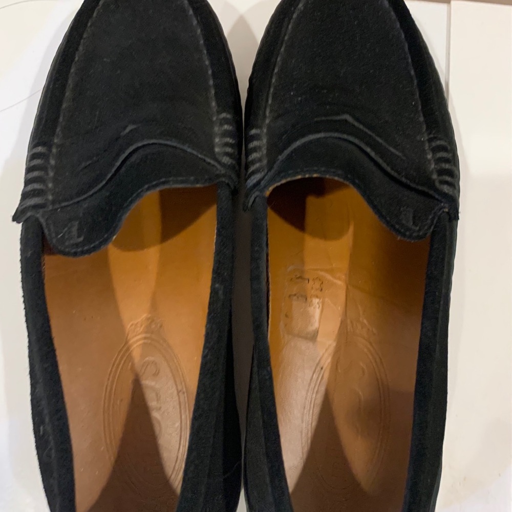 Tod’s black loafers
